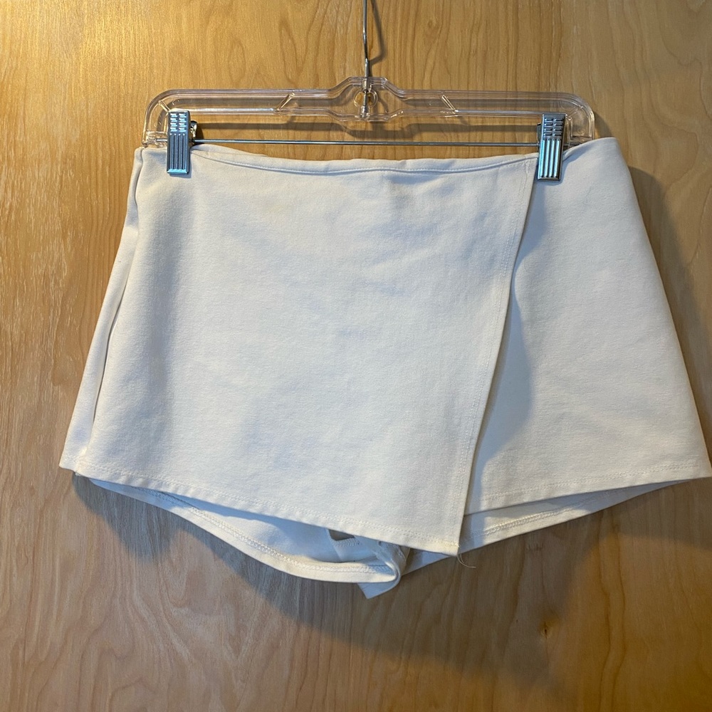 Mini white revolve skort